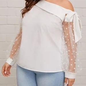 Blouse with sheer polka-dot sleeves